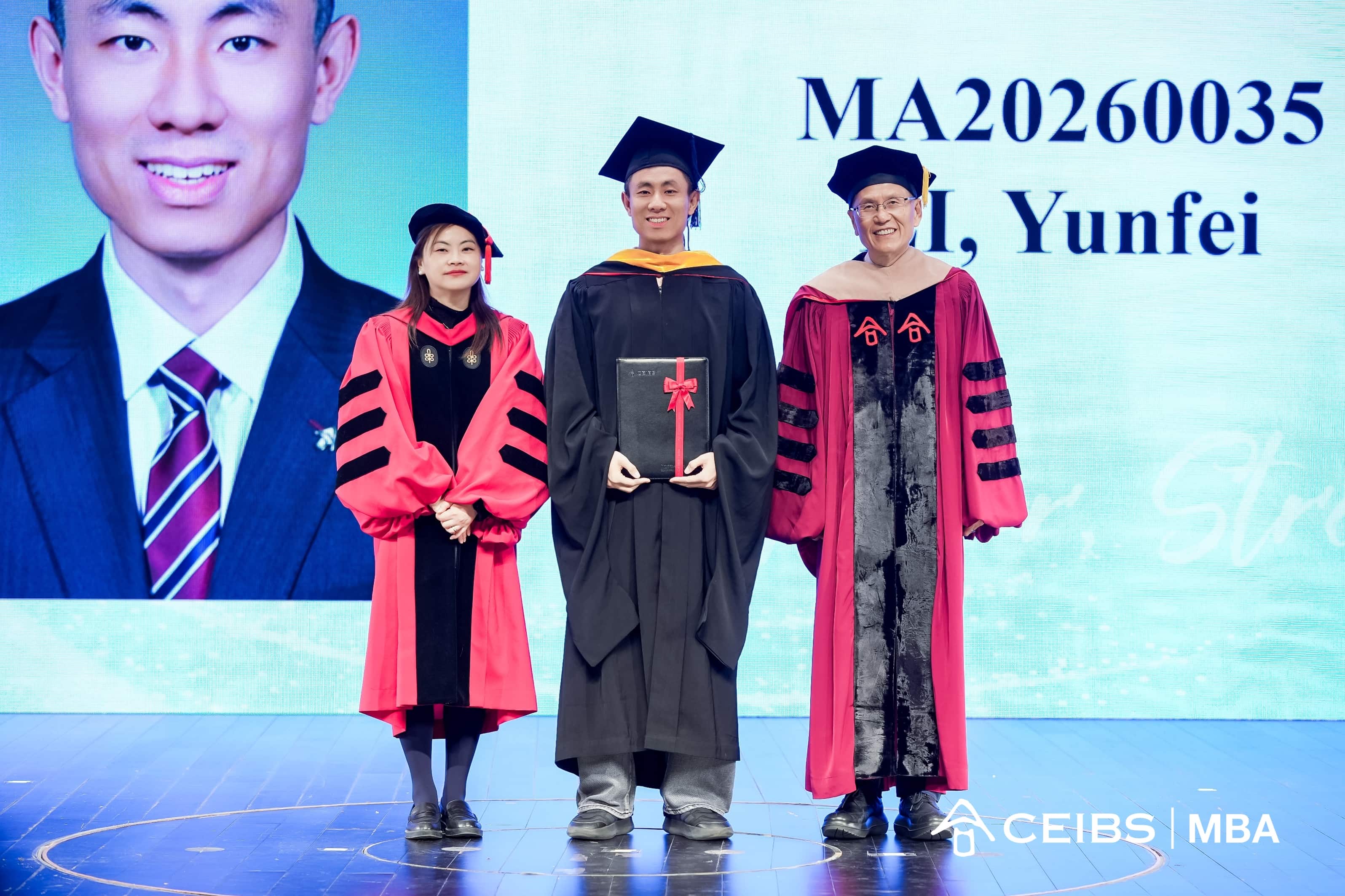 Professors present graduation certificates to graduates